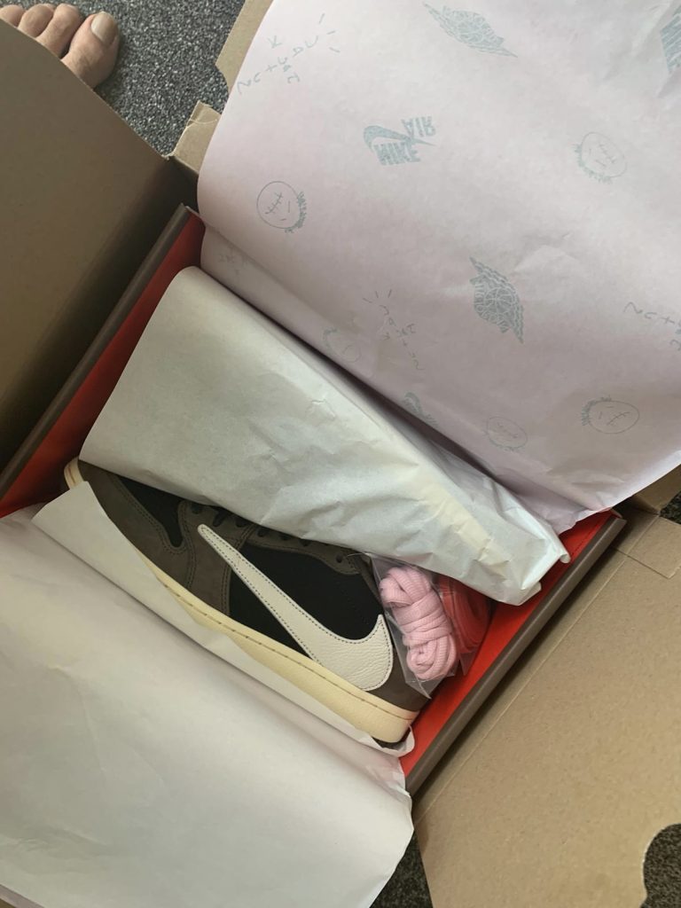 Air Jordan 1 Low Travis Scott Mocha inside original Nike box packaging